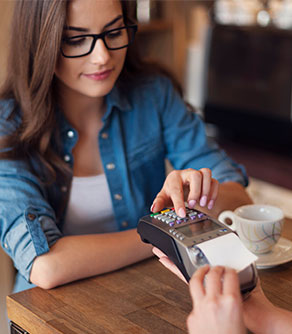 Merchant Services_41110728_woman terminal reader